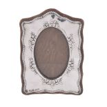 A silver small photograph frame by Boots Pure Drug Co.