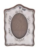 A silver small photograph frame by Boots Pure Drug Co.