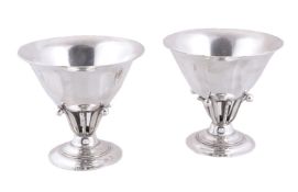 Georg Jensen, a pair of Danish silver pedestal bowls