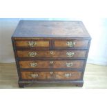 A Georgian Batchelors chest of drawers, two short over three long