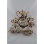 A Mid 20th C. Hand Painted / Gilded Coffee Set from Singapore Circa 1950