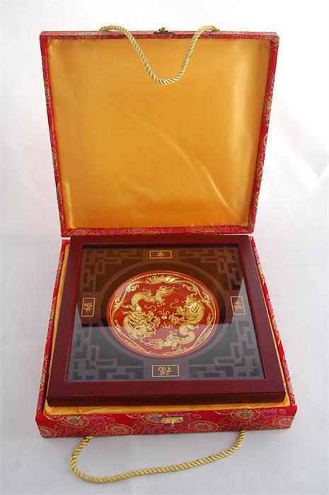 Framed Chinese dragon plate with gold metal embellishments