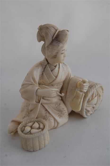 Meiji Period Japanese Ivory Okimono of a seated Geisha, signature to base