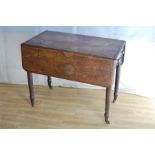 A 19th Century Mahogany Drop Leaf Table