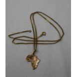 A gold metal necklace of Africa