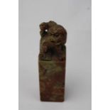 An Early 20th C. Chinese Carved Soapstone / Jade square sectioned seal surmounted Fu dog and cub.