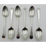 Set of six 18th Century silver lace back tea spoons inscribed "British",