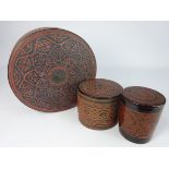 Thailand lacquer circular box and cover decorated in red and black 20cm diameter and two other