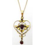 9ct Gold scroll pendant necklace set with garnets Condition Report & Further Details