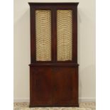 George III mahogany bookcase on cupboard,