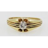 18ct Gold Ring with a claw set single diamond,