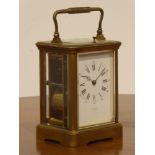 Early 20th Century brass carriage clock, white enamel dial signed H.