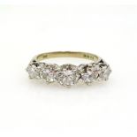18ct Gold Ring set with five graduated diamonds,