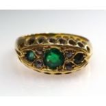 Early 20th century 18c Gold Ring with three emeralds and four diamonds Condition Report &