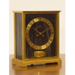 Jaeger Le Coultre Atmos Clock with blue faux marble front and side panels in brass case,