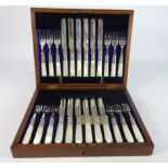 Set of twelve plated Dessert knives and forks with mother of pearl handles and engraved blades in