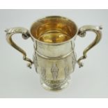 Late Victorian silver two handled baluster Vase with applied strapwork decoration and leaf capped