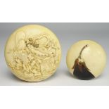 Japanese ivory Kagamibuta Netsuke carved with figures and with further figures and signature to the