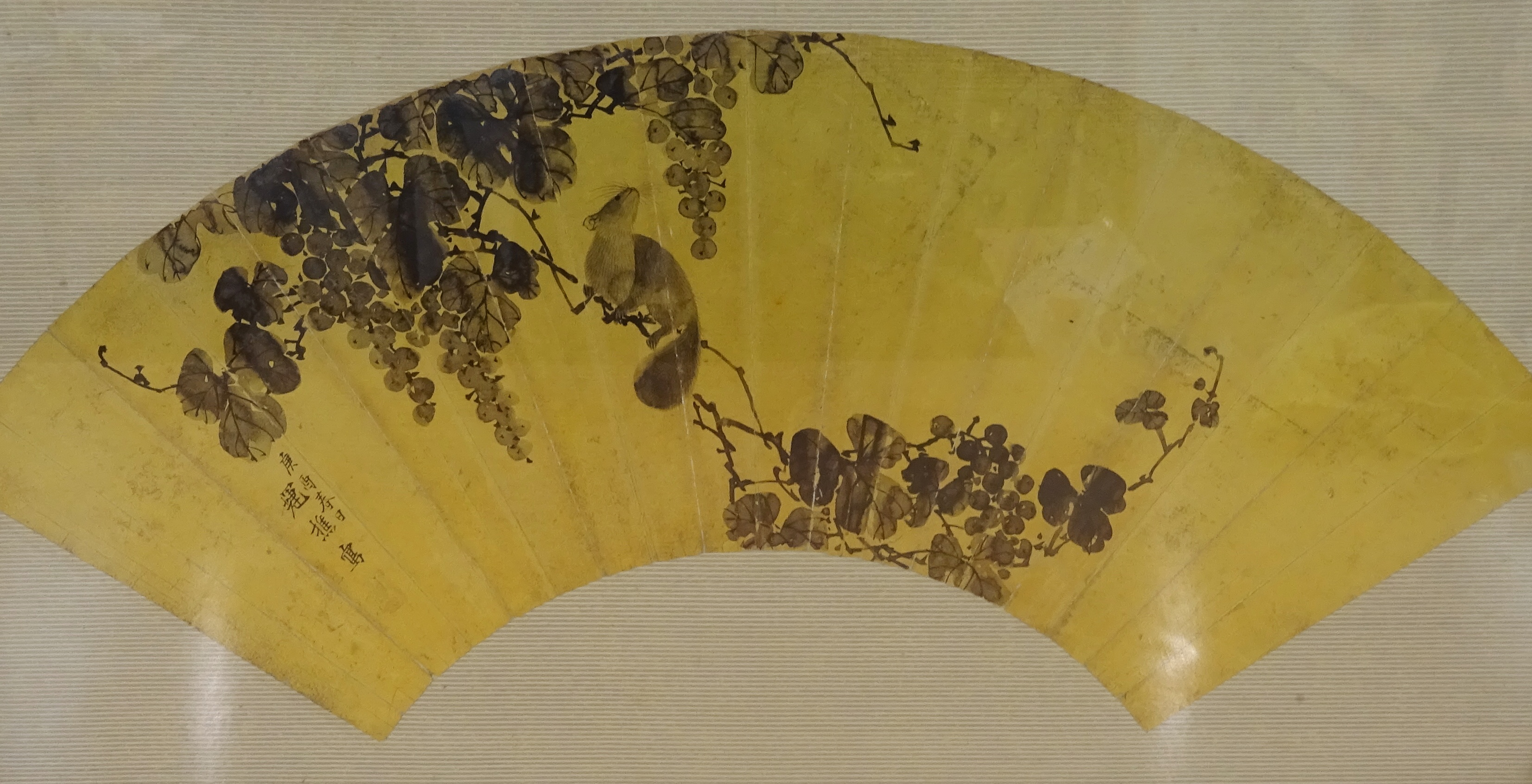 Japanese fan painting with a squirrel on a flowering branch and script on a gilt ground and another - Image 3 of 3