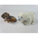 Royal Copenhagen figure of a Polar Bear cub No.535 15cm long and another of a seated Dachshund No.