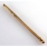 9ct gold Swizzle Stick with engine turned decoration, hallmarked for Birmingham 1950,