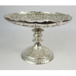 Victorian silver Comport, the raised border chased and embossed with fruit and stylised leaves,