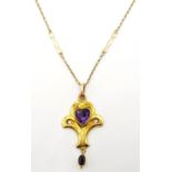 9ct Gold Pendant of scroll design set with a heart shape amethyst and with an amethyst drop on a