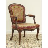 19th century French walnut open armchair, carved cresting rail and moulded frame, cabriole legs,