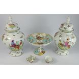 Pair of Victoria baluster Vases and covers decorated with birds and flowers and on wooden bases,