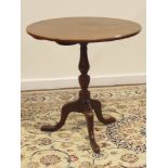 Early 19th Century mahogany circular tilt top occasional table on a vase turned column and triple
