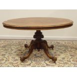 Victorian figured walnut oval loo table quatrefoil base, W134cm,