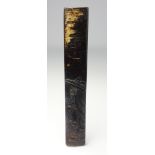 19th Century Japanese horn Kozuka decorated with a figure and bamboo,