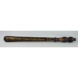 Wooden Truncheon with painted decoration, 52cm long.