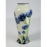 James Macintyre Florian ware baluster vase designed by William Moorcroft and decorated with blue