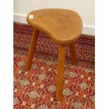 'Lizardman' oak three legged stool with dished adzed seat, by Derek Slater of Crayke (ex.