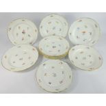 Set of seven Meissen plates decorated with floral sprigs,