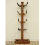 20th century Arts & Crafts style oak coat rack fitted with ten horns, copper tray,