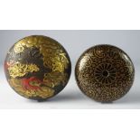 Japanese lacquer Kagamibuta Netsuke with an all over floral design and another with a red and gilt