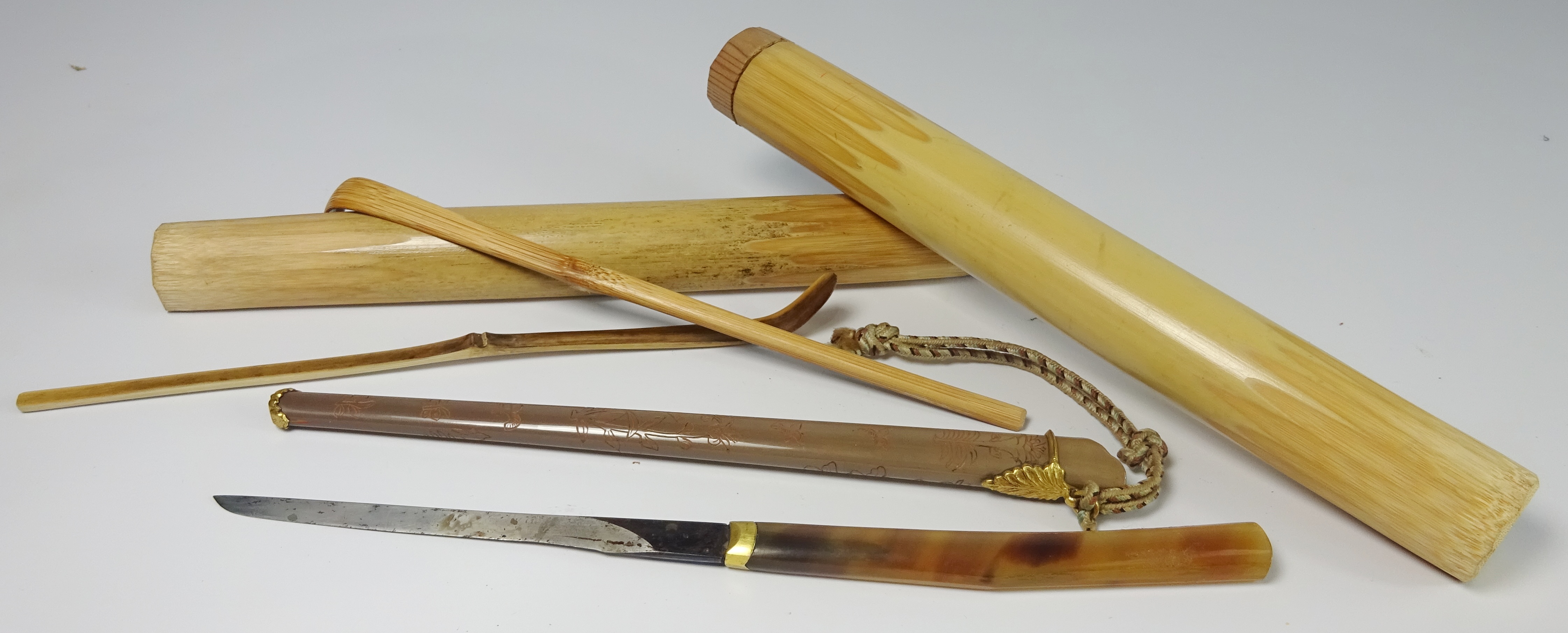 Chinese horn and lacquered knife with sheath with incised decoration and gilt metal mounts 24cm