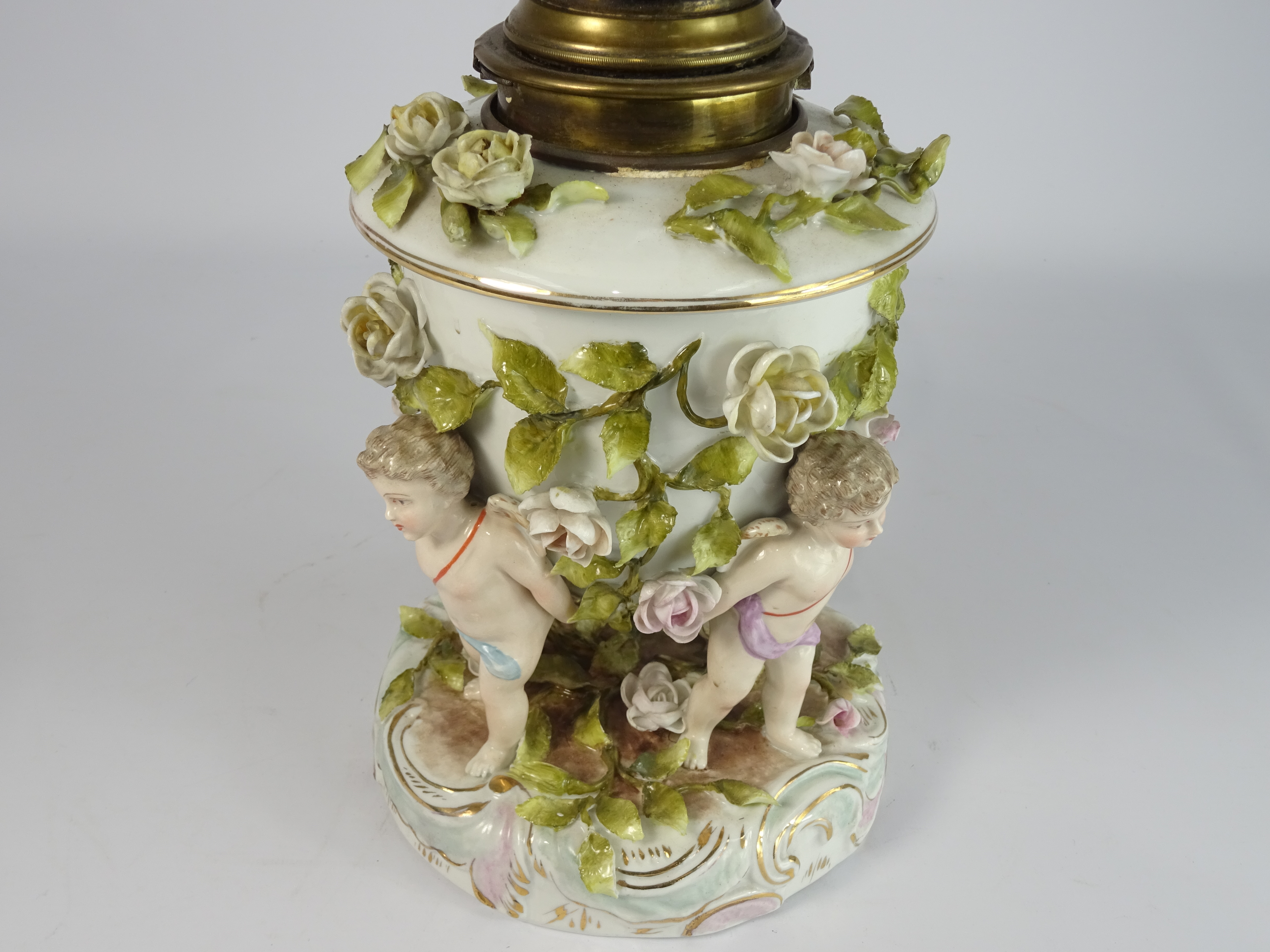 Thuringian Table oil Lamp, the base with encrusted flowers and on cherub supports, H51cm. - Image 2 of 2
