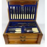 Early 20th century matched canteen of silver-plated cutlery in fitted oak case dated 1912,