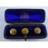 Set of three Victorian 18ct. gold dress studs, hallmarked for 1895, cased, 3.6gms.