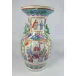 19th Century Cantonese baluster Vase decorated with panels of figures and flowers in famille rose