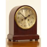 Early 20th Century mahogany cased arch top mantel clock with silvered dial,