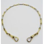 18ct two colour gold Watch Chain composed of oblong links, 31cms long, (20gms).