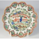 Chinese famille-verte saucer dish from the Boothman Smallwood Collection with serpentine rim and a