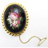 Italian micro mosaic oval Brooch decorated with a spray of flowers within a ball studded gilt metal