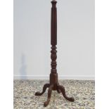 Early 20th century mahogany standard lamp, reeded and acanthus carved column, four splayed supports,