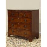 Early 19th century mahogany chest, two short and three long drawers, on bracket feet, W105cm,