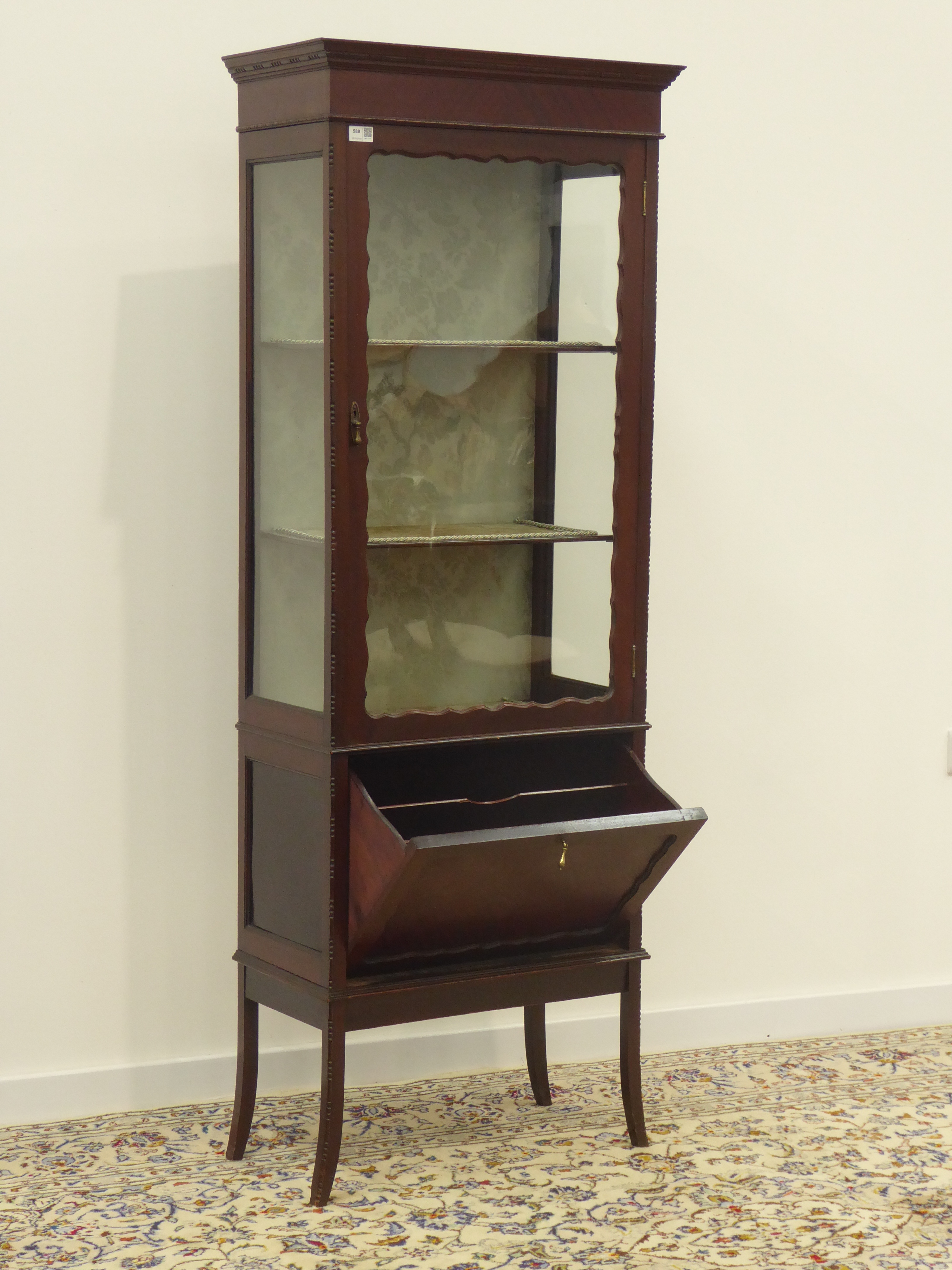 Mahogany Display Cabinet with stepped cornice enclosed by single glazed door with fall front